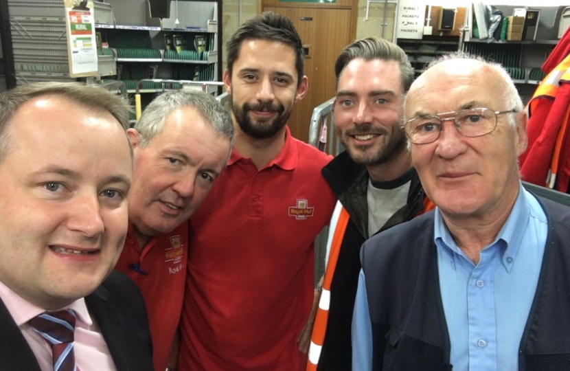 Clwyd West AM Darren Millar with postmen Greg, of  Mochdre, who is working his first Christmas with Royal Mail and  Paul, who has been with them  29 years and will be  retiring in  January.